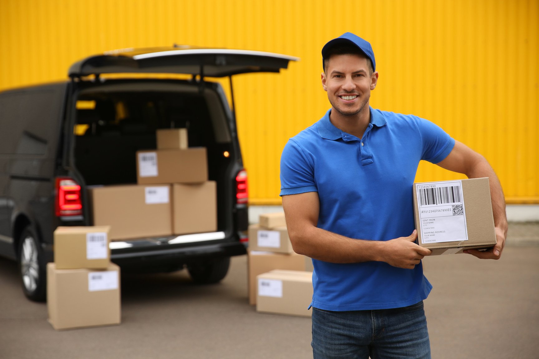 Courier with Parcel near Delivery Van Outdoors